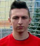 Krystian Barto�