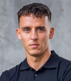 Dominik Hola�