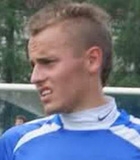 Bartosz Jamro�