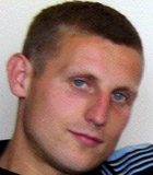 Mariusz Ko�min