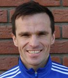 Mariusz Kuku�