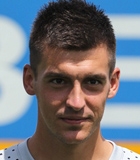 Maciej Pochro�