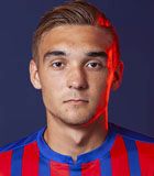 Kamil Skrzypi�ski