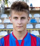 Tomasz �lusarz
