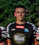 Tomasz �o�a